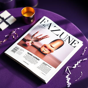 PHOTO MAGAZINE ON A PREMIUM LUXURY PURPLE TABLE TOP VIEW.jpg