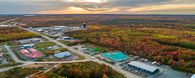 Elmsdale-business-park-water-tower-sun-and-clouds-fall-leave-website-1024x410.png