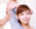 Client receiving assisted shoulder stretch therapy at Presence Wellness Center and Spa, a holistic wellness center in Auburn, CA.