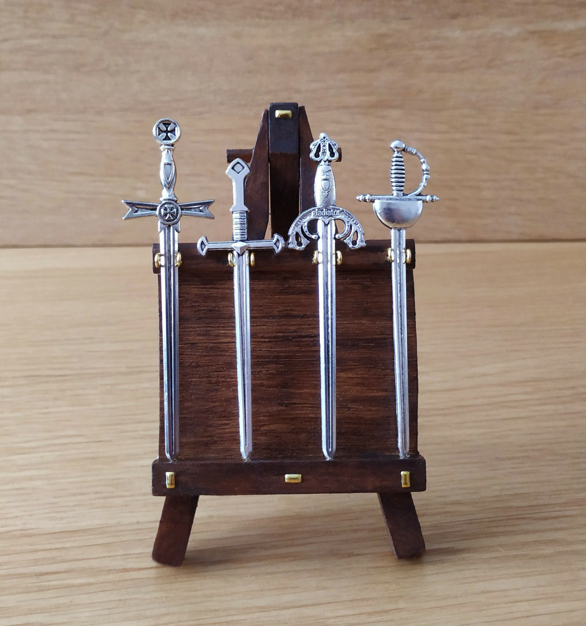 dolls house sword stand rack with four metal swords