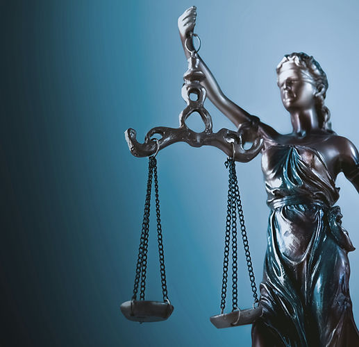 Statue of justice with scales of justice