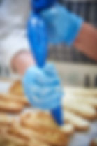 Chocolate eclairs by Pimbletts Bakery