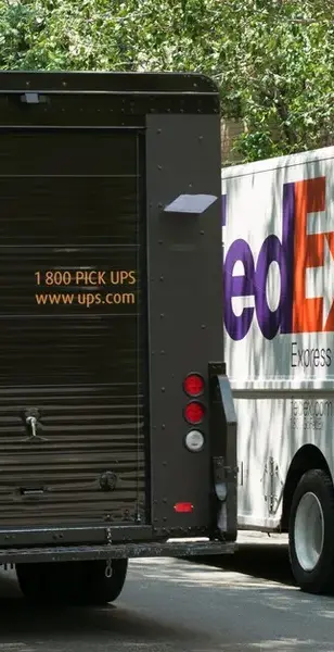USPS and FEDEX Trucks