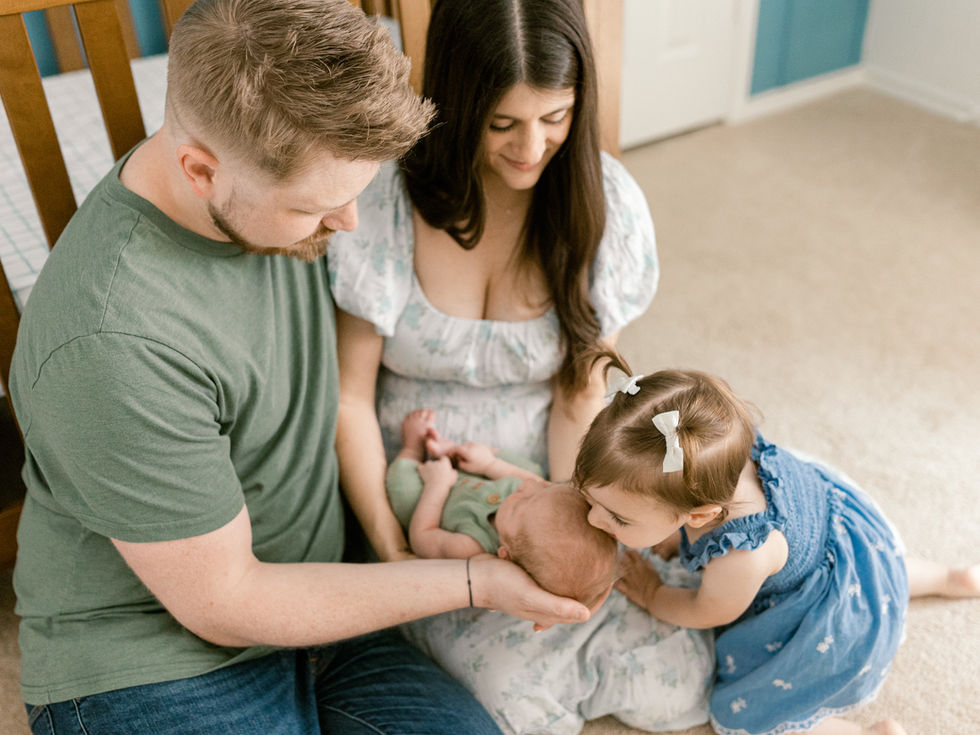family at home newborn session