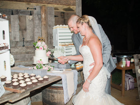 Couple cutting their cake on wedding day