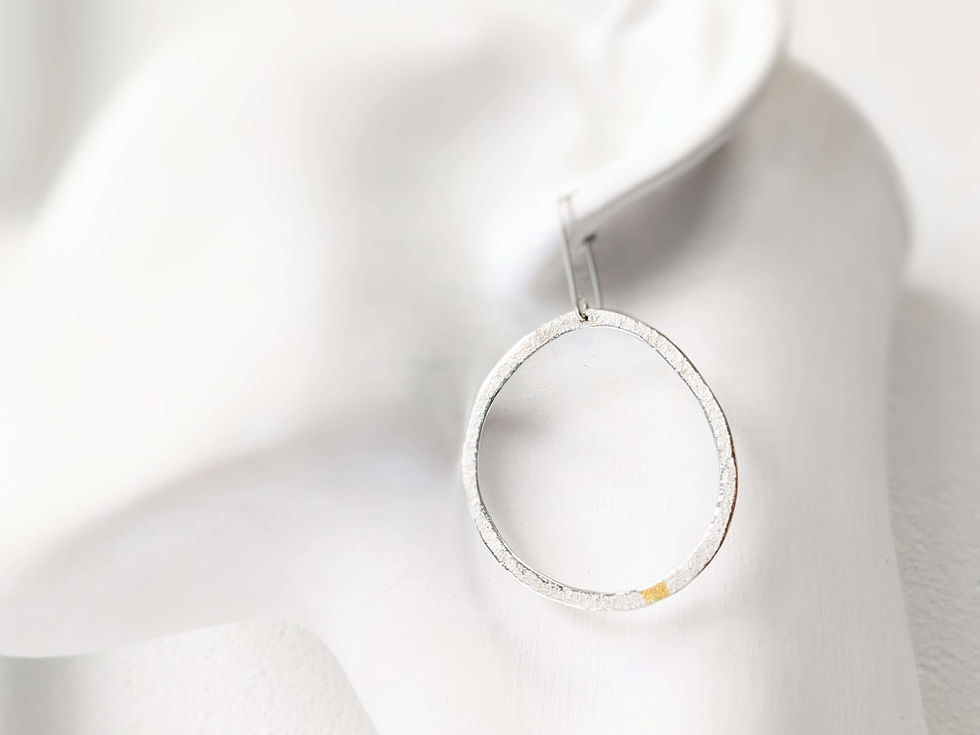 Silver Beach Stone Hoops on Ear