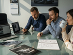 Team planning automotive website at dealership