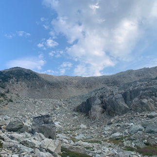 View of boulder field approach to unnamed lake by Sugarloaf Mountain.