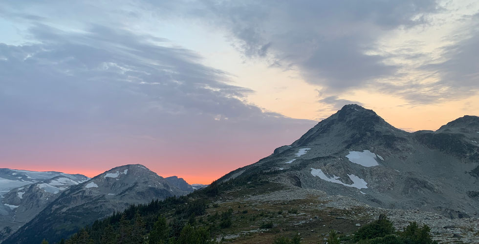 Sunset pinks behind Sugarloaf Mountain.