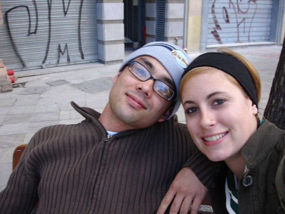 Chad Ishiyama and Elyse Hughes graffittied garages in background