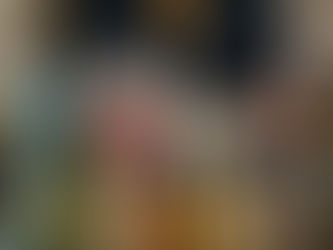 dogs modelling rosettes from a pet show