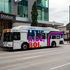White Valley Regional Transit bus with colorful RIDE, BOLT ad stopped at downtown Street Station; ridevrt.org visible.