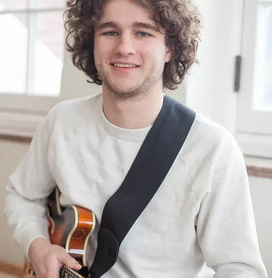 Josh, a top guitar teacher in Toronto, is pictured here.