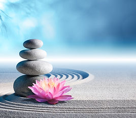 A-rock-sculpture-with-a-lily-in-a-zen-meditation-garden.jpg