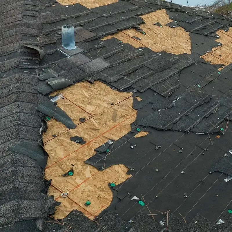 6794f7c92f009b7db25a838c_damaged-house-roof-with-missing-shingles (1).webp