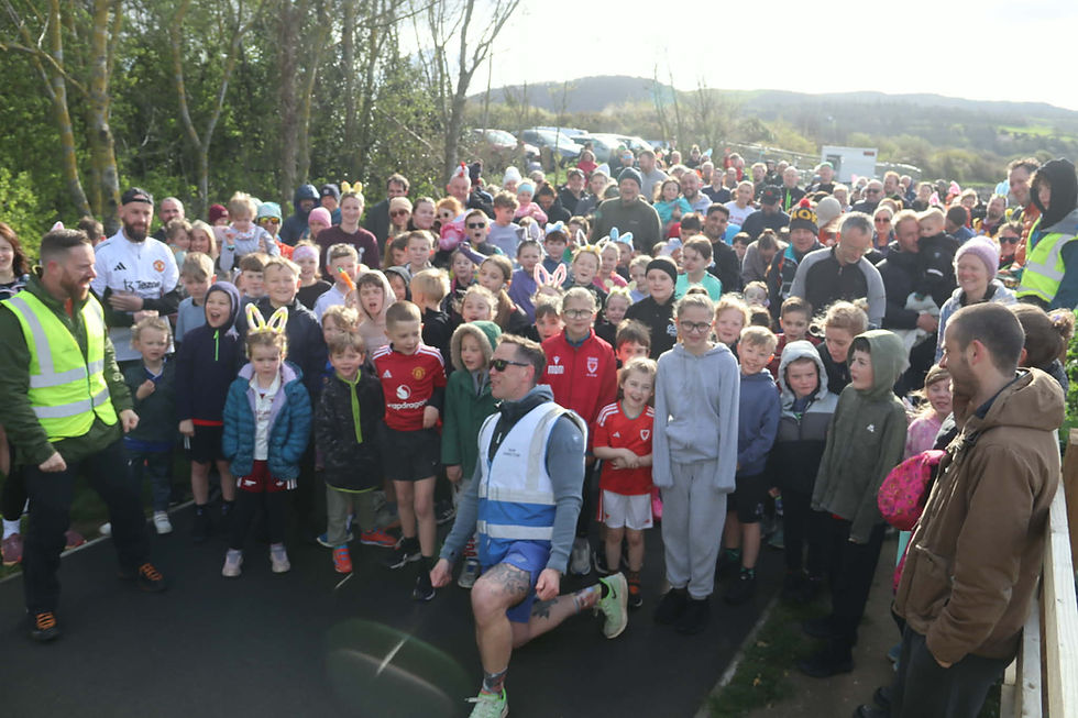 *Pictured above - junior parkrunners and officials at Conwy last Sunday.