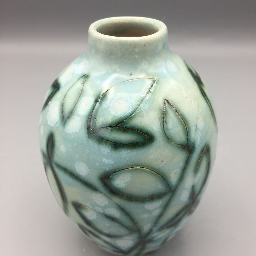 Carved stem vase