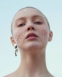 Model with ice on her face.