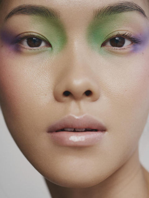 Close-up image of an Asian Model wearing pastel coloured eyeshadow.