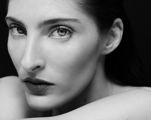 striking monochrome portrait with defined brows and sculpted cheekbones for bold beauty.