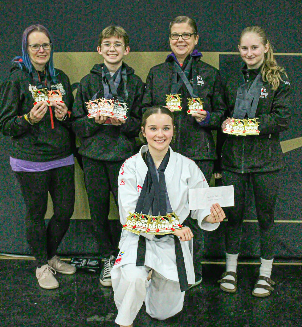 The Stonetown Karate Centre (SKC) had five students earn top-three finishes at the Orangeville Open Martial Arts Championship at the Athlete Institute in Mono, Ont. Nov. 16. Pictured kneeling in front is Sensei Jalyne Lorentz. In the back row, from left to right, are Shannon Campbell, Fox Houston, Morgan Houston and Marieke Van Lierop.