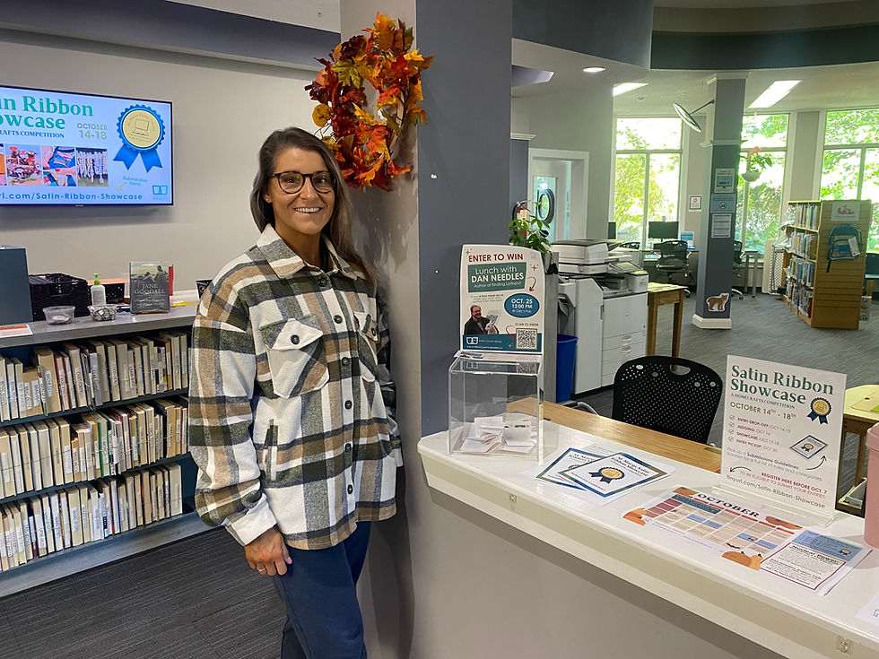 The Satin Ribbon Showcase will make its debut at the St. Marys Public Library. Pictured is Caroline Rabideau, library services coordinator at the St. Marys Public Library.