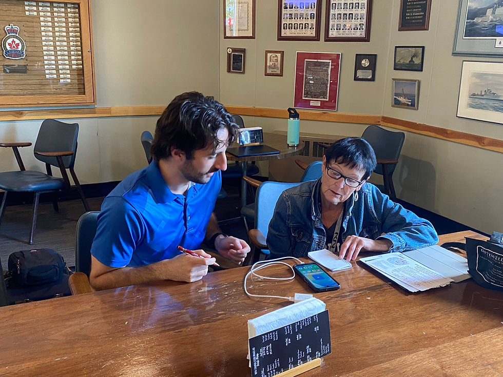 Nyden Greenfield, research assistant at Gateway Center of Excellence in Rural Health mentors. Goderich resident Sharon Pengelly on technology navigation.