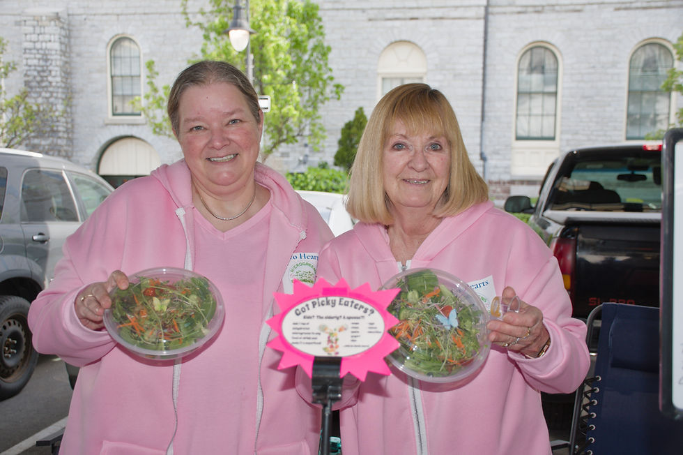 Terri Waugh (left) and her mom Alice Smith offer up healthy microgreens at the St. Catharines market. ~ Luke Edwards photo