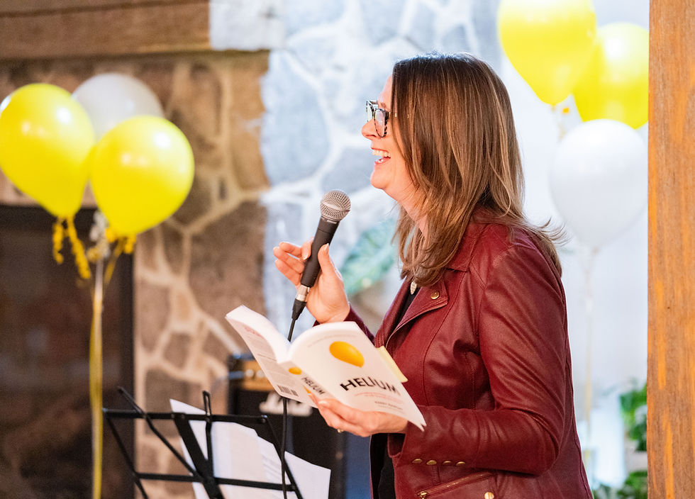 Kerry Ramsay, Fresh Idea Collective founder, reads a passage from her book Helium to the audience at the book launch, which took place on Nov. 13 at the Livery Yard.