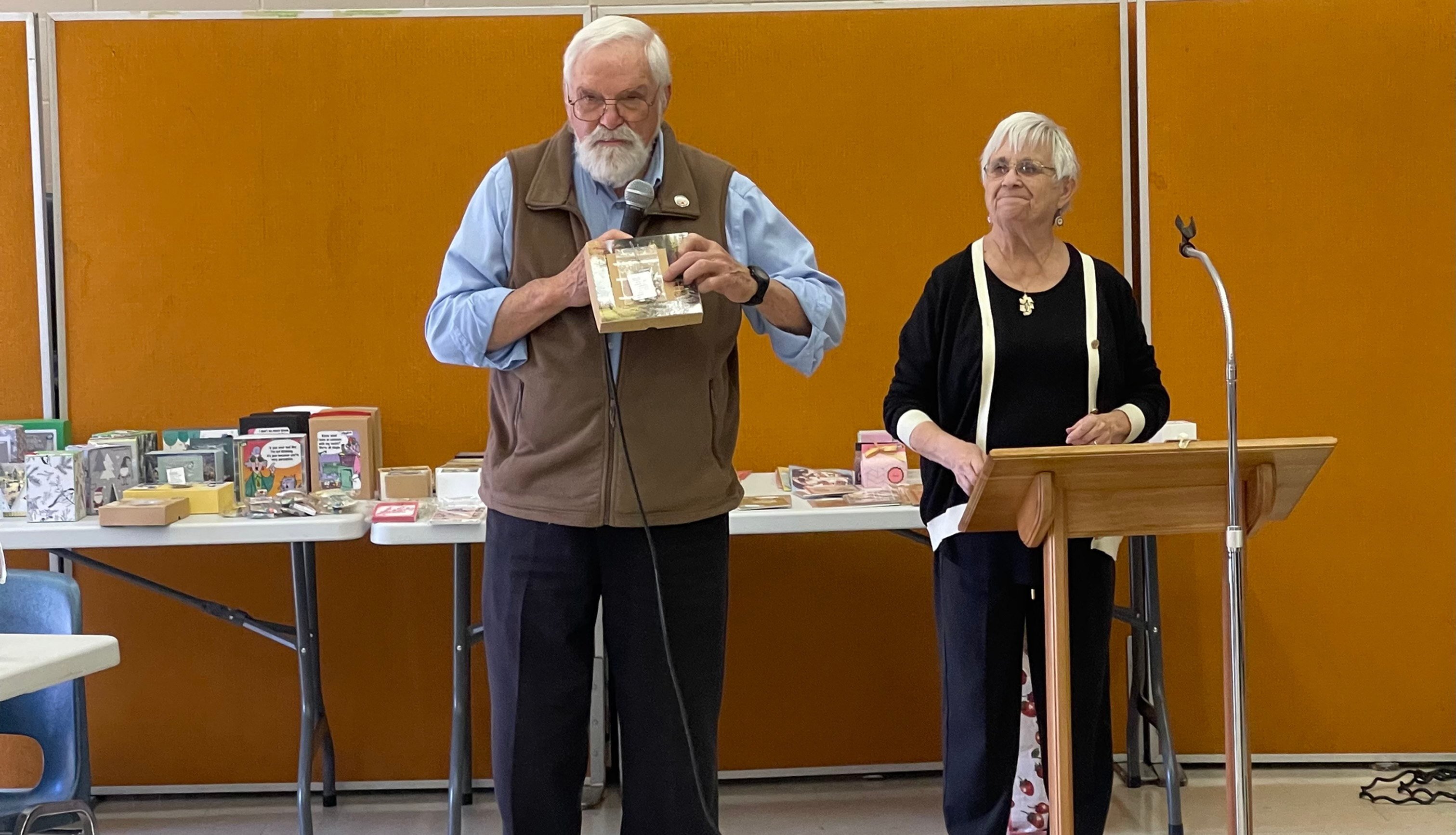 Richard and Joan Hryniw of Lakeside display some of the decorative little boxes they create from recycled greeting cards and calendars to raise money for cancer care. The couple shared the story of their fundraising initiative during last Thursday's High Noon luncheon at Grace United Church in Tavistock. Gary West photo