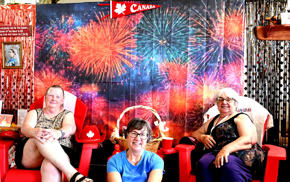 Seated from left to right in the Canada Day display at the Archive and Museum at Chesterfield are Plattsville and District Heritage Society volunteer Donna Caldecott, society president Denise Tew and society curator Marg Schiedel. The display is part of the museum’s annual exhibit, Holidays and Celebrations that Bring Us Together. Galen Simmons photo