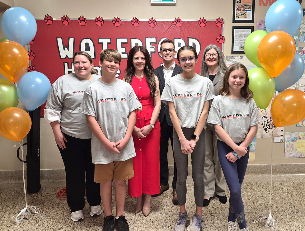 On May 5, the Grand Erie District School Board unveiled the Waterford Public Intermediate Campus with a dedication and ribbon cutting ceremony to officially open the new wing. From left are (front) Waterford Public Schools students Otis Anger, Lily Acland, and Lily Payne, (back row) Adrienne Cunningham, Principal WPS; JoAnna Roberto, Director of Education; Regan Vankerrebroeck, Superintendent of Education; and Susan Gibson, Chair of the Board.