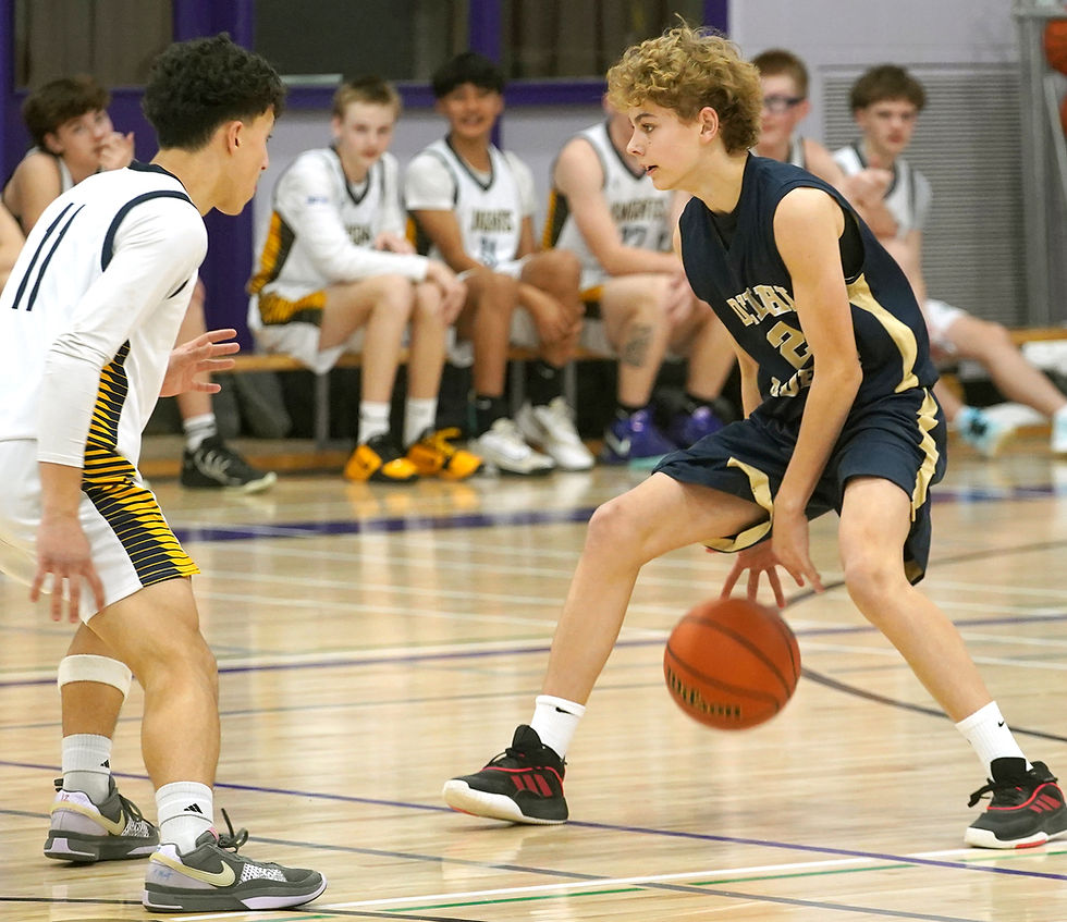 Delhi Raiders guard James Hamilton (right) brings the ball upcourt against defensive pressure from College Avenue’s Faud Alezzi.