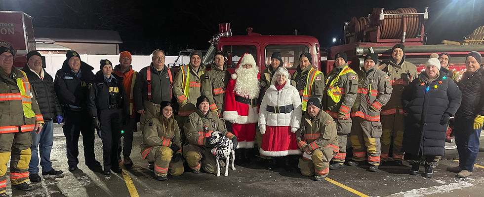 Santa and Mrs. Claus were joined by “Peanut,” a four-year-old Dalmatian fire dog, as children gathered to share their Christmas wishes during Hickson’s holiday celebration. Gary West photo