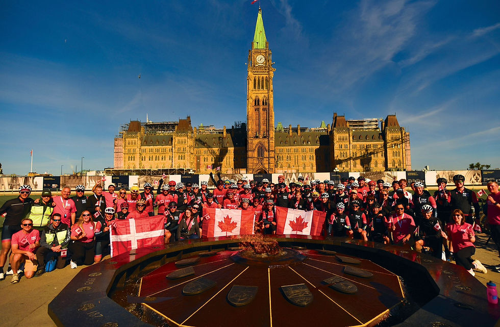 Riders in the R4 Campfire Circle Challenge gather at Parliament Hill in Ottawa, one of the key stops along the 850-kilometre fundraising journey in support of children living with cancer and serious illness.