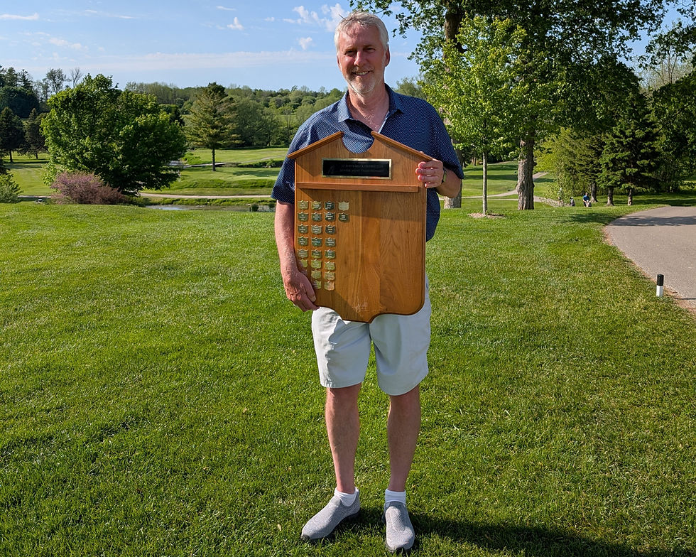 Rob Cowan holds the champions’ plaque after winning the St. Marys Golf and Country Club’s Senior Men’s Invitational tournament May 27. Cowan won the tournament for the second consecutive year.