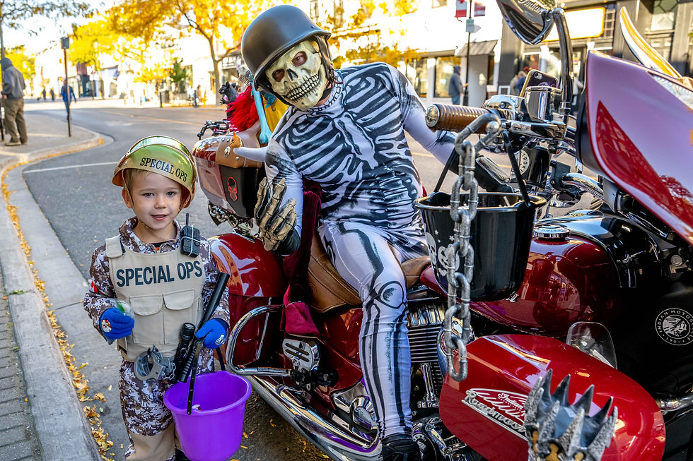 Four-year-old ‘Special Ops’ Wyatt Litton from Grafton poses with skeleton Tony Moscariello from Cobourg. Tony dressed up his motorcycle and was positioned in front of Cobourg’s Buy and Sell on King Street.