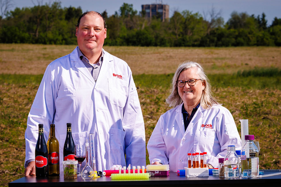 Jim Willwerth, associate professor of biological sciences and Cool Climate Oenology and Viticulture Institute (CCOVI) researcher, joins Debbie Inglis, professor of biological sciences and CCOVI director, at the Brock University Norris W. Walker Research Farm. ~ Brock University photos