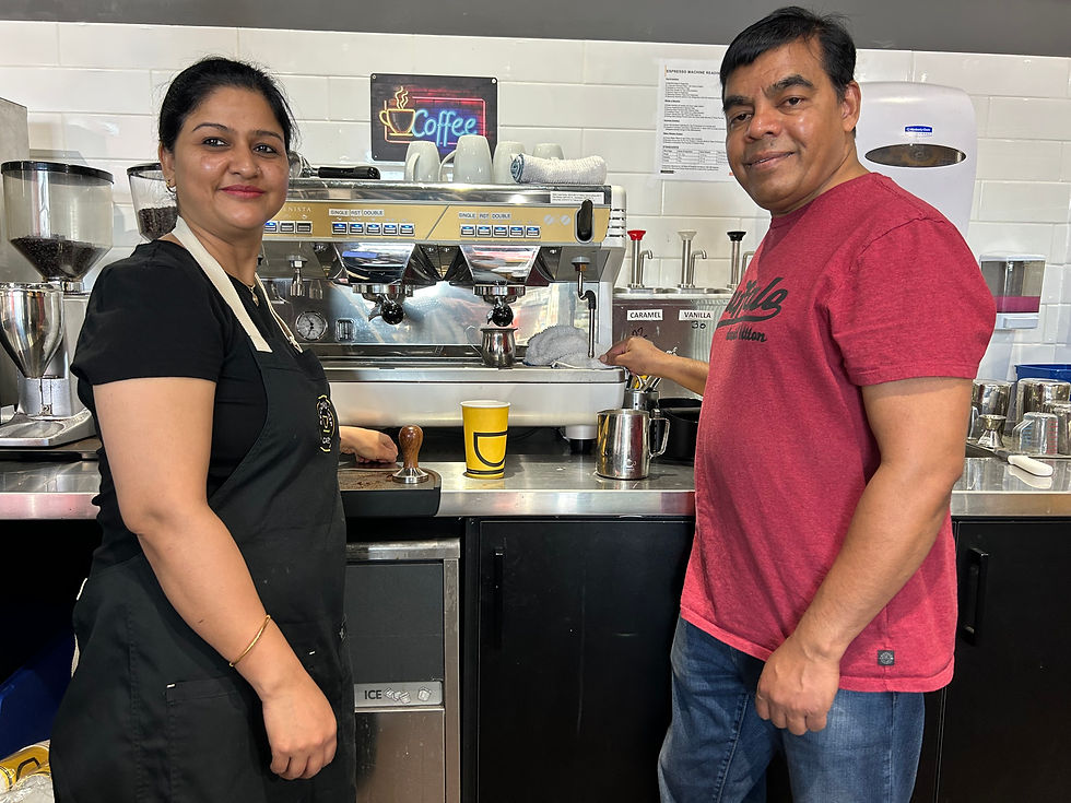 Sanjay and Kiran Biswal prepare coffee inside their New Hamburg business, where they have expanded their offerings to include a Second Cup café within their existing Pita Pit location. Amanda Nelson photo