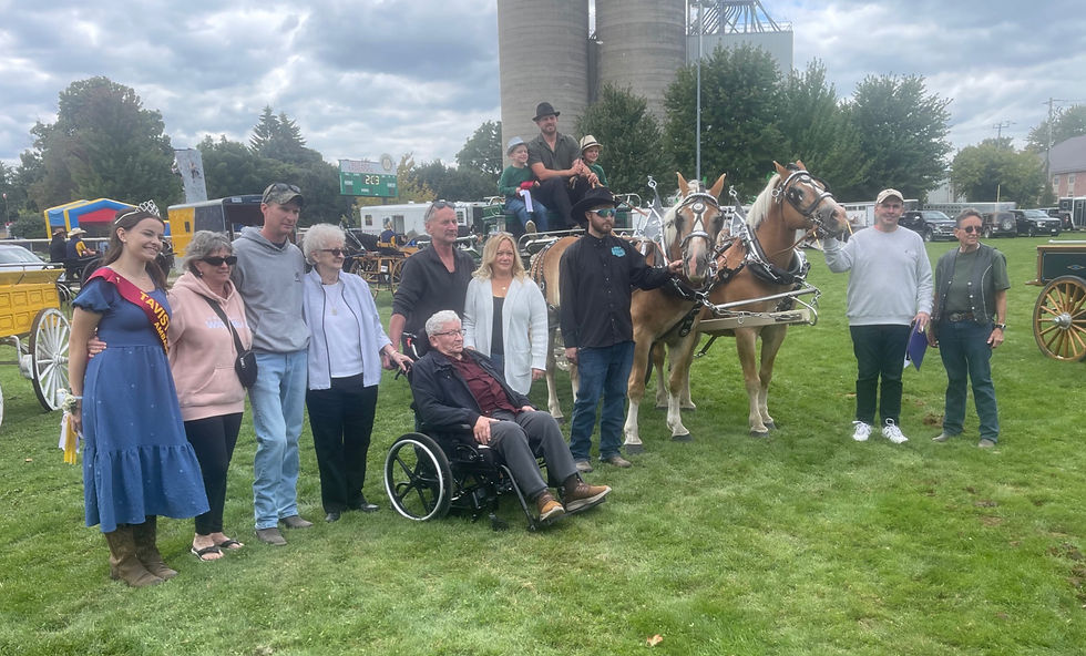Ken Mogk was the centre of attention Saturday as his family and friends gathered to honour his decades of leadership and hard work organizing the heavy horse show at the Tavistock Fall Fair. Gary West photo