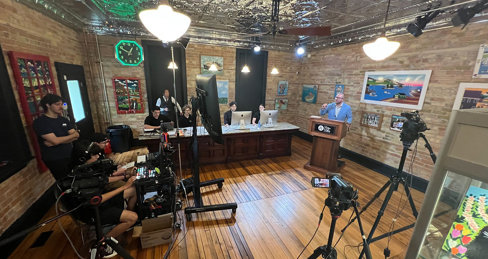 A production crew from Ballinran Entertainment works behind the scenes during a Miller & Miller Auctions livestream event at the historic Baden building. Contributed photo