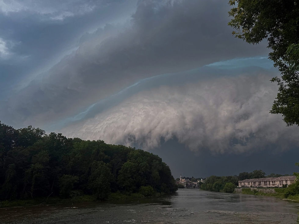 A menacing shelf cloud moves over the Grand River in Paris shortly before powerful winds and heavy rain swept through the community, leaving behind widespread damage and power outages.