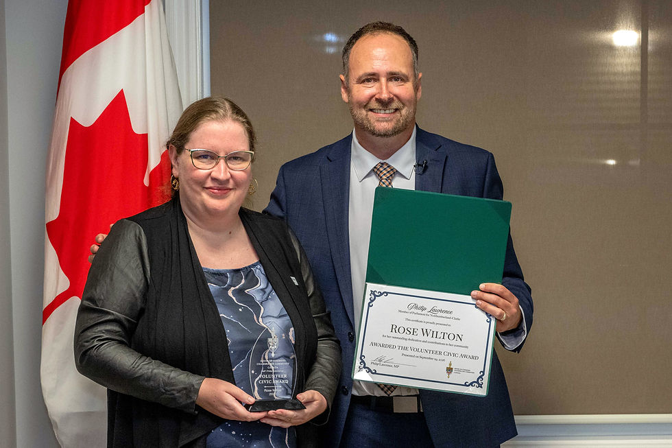 Volunteer Civic Award Winner Rose Wilton, founder of the Rose Quest, receives her award from MP Philip Lawrence.