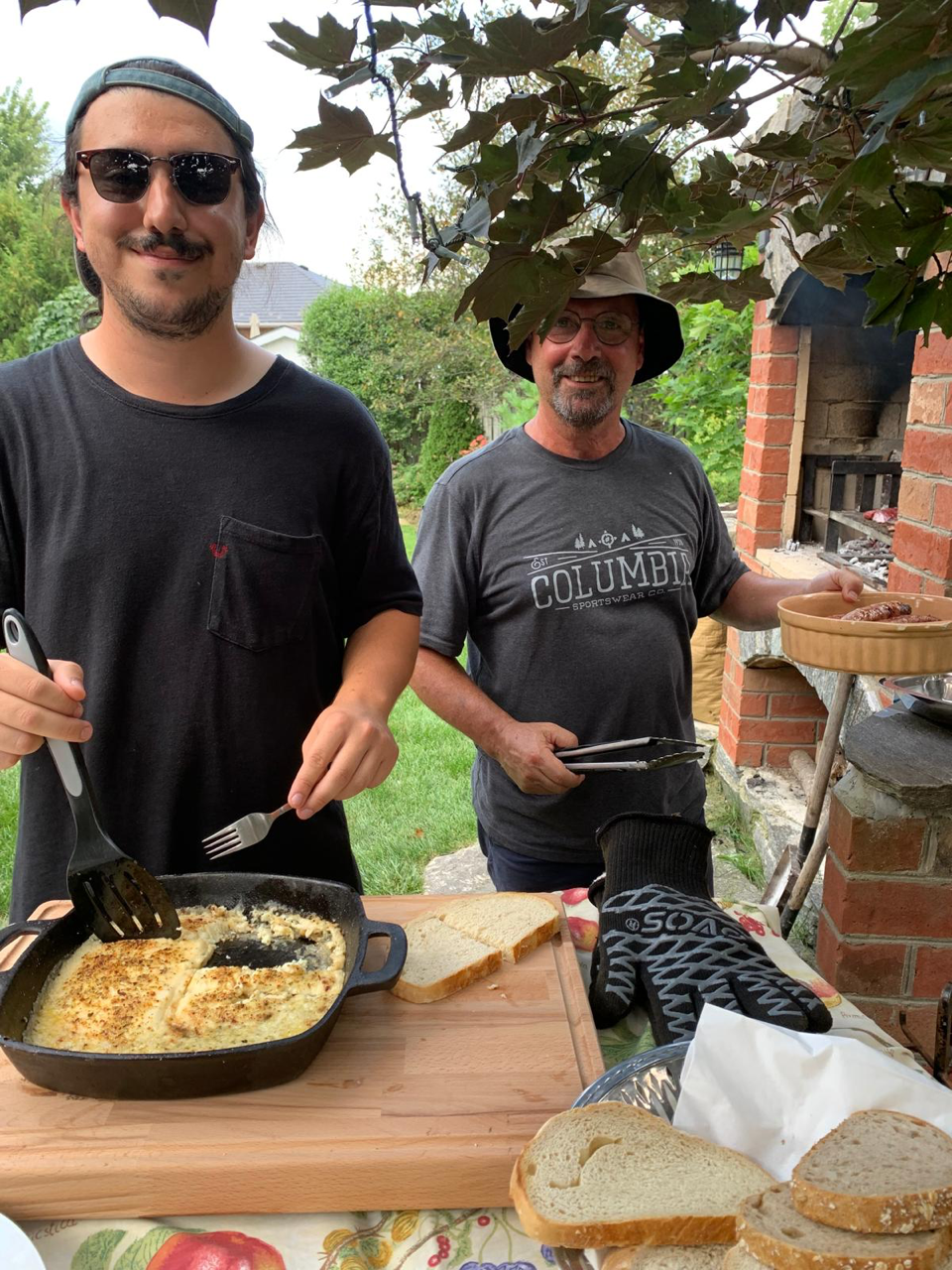 Sous chef Joaquin Garcia and his father Gus Garcia enjoying home Argentina cooking ahead of Café Bouffon’s pop-up dinner series where the pair will work together to serve attendees at the Jan. 29 event.