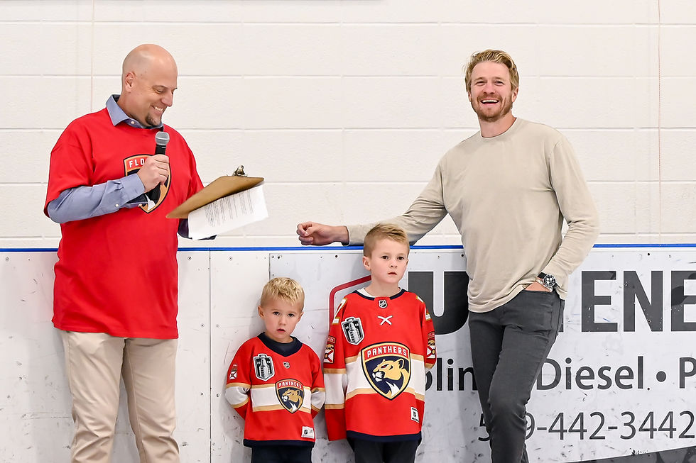 Zac Dalpe shares a laugh with his longtime supporter Doug Green (left) while Dalpe’s sons proudly sport Florida Panthers jerseys at a jersey retirement event held at the Brant Sports Complex last year. In our September 24th edition, we mistakenly identified Doug as Tyler Pelton — our apologies, Doug! Thanks for being a good sport, both on and off the ice.