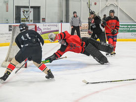 Firefighters face off on ice for hospice fundraiser