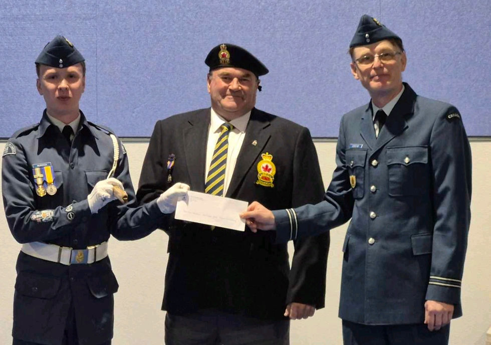 Royal Canadian Legion Branch 532 New Hamburg Poppy Chair Gary Bender presents a check to the Air Cadet 822 Tutor Squadron. To the left is Warrant Officer first Class James Murdoch and to the right, Squadron Capt. Gibbons. Contributed photo