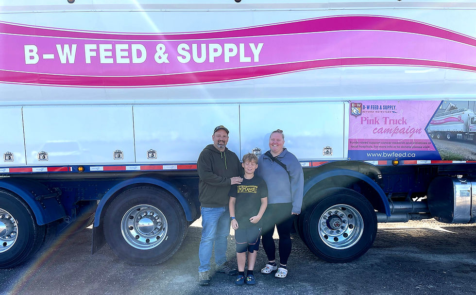 From left, Declan, Dugan and Christina Thrower were proud to support the campaign. Dugan Thrower, who was diagnosed with colon cancer six years ago, is now cancer-free after treatment. He says he is grateful for the medical care that helped him win the battle and is glad to give back to cancer research and care initiatives. Gary West photo