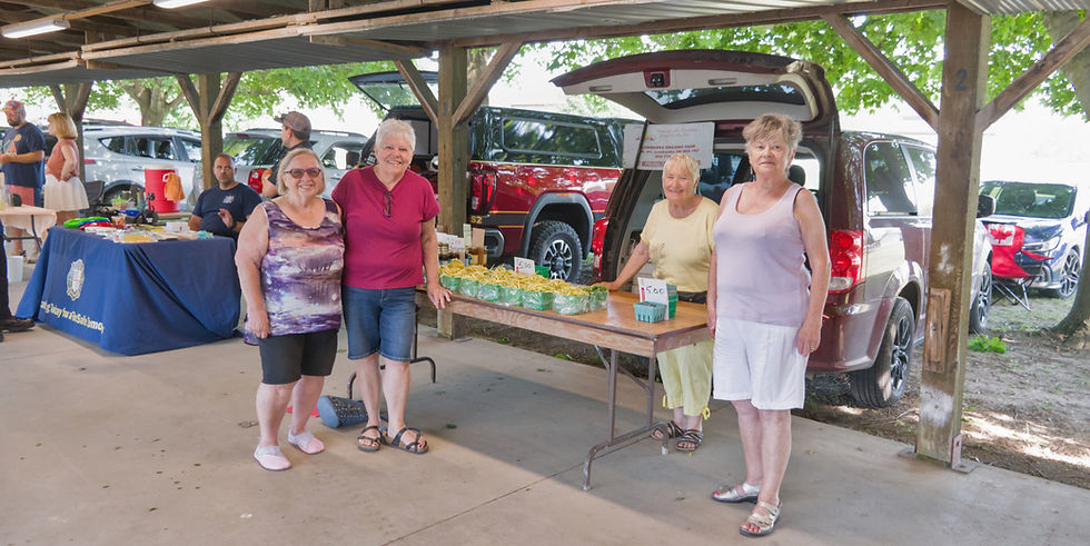 The Wainfleet Fall Fair is partnering with local businesses, regional fair groups and the Wainfleet Farmers Market on several upcoming events and fundraisers. From left: Fair past president Norma Bird, Sharon Svob, market vendor Alice Csanig, and Sharon McMillan. ~ Luke Edwards photo