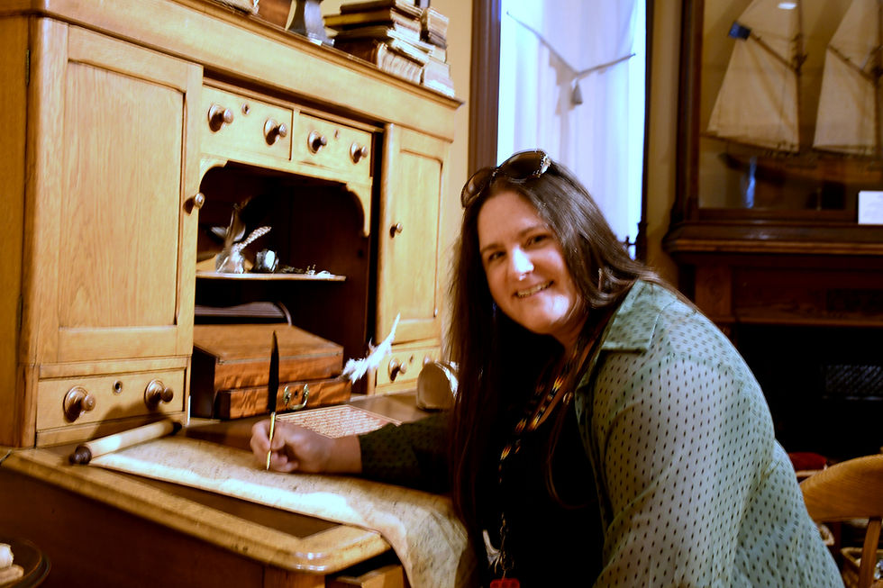 Stratford Perth Museum manager of exhibits and education doing a little writing in the museum’s hobbit hole.